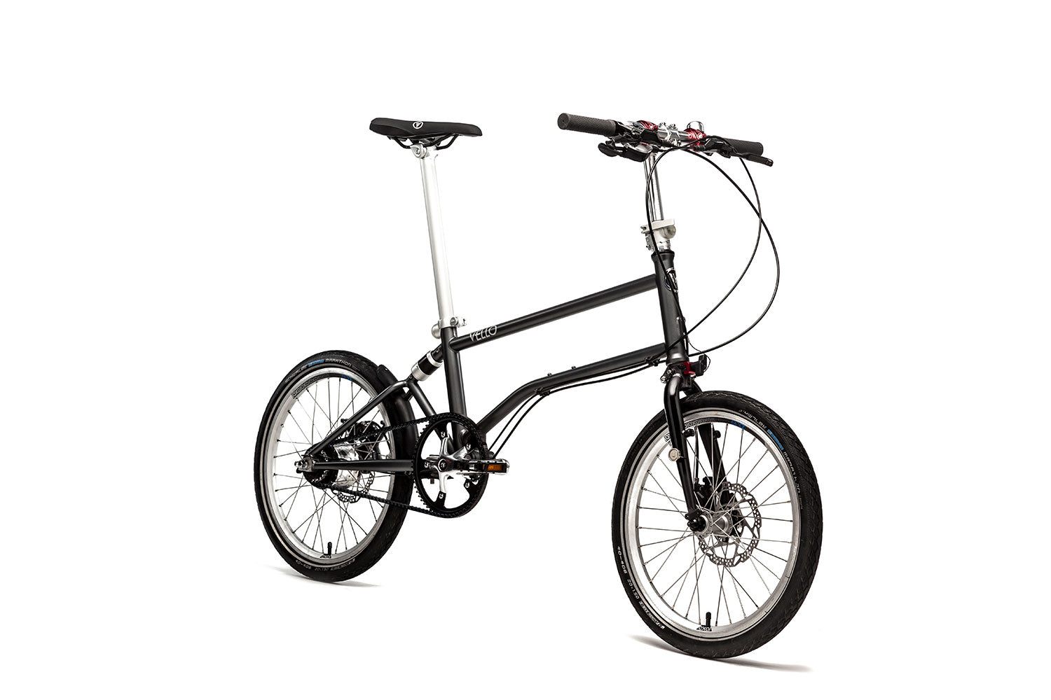 Ein entfaltetes VELLO Alfine Faltrad / Klapprad in der Farbe Anthrazit, mit 20 Zoll Schwalbe Marathon Reifen, der Fokus sitzt auf den faltbaren Lenkern.
