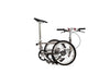 Ein gefaltetes VELLO BIKE plus Automatic Titan Faltrad / Klapprad in der Farbe gebürstetes Titan, mit 20 Zoll Schwalbe Kojak Reifen und entfalten Lenkern.
