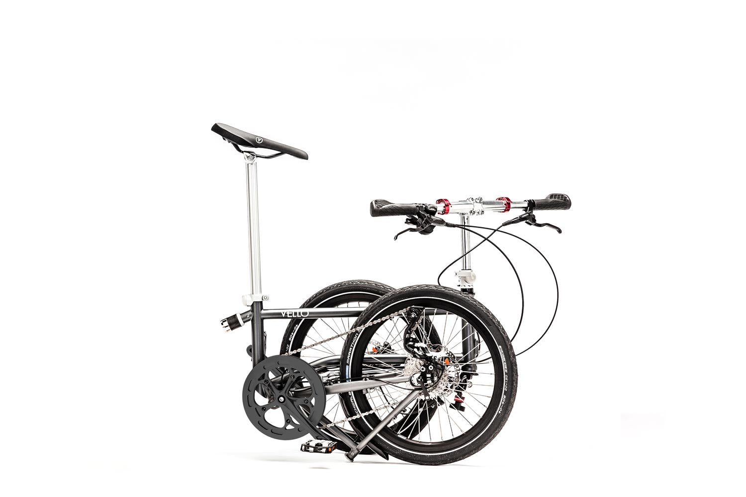 Ein gefaltetes VELLO Rocky Faltrad / Klapprad in der Farbe Anthrazit, mit 20 Zoll Schwalbe Marathon Reifen, mit entfalteten Lenkern.
